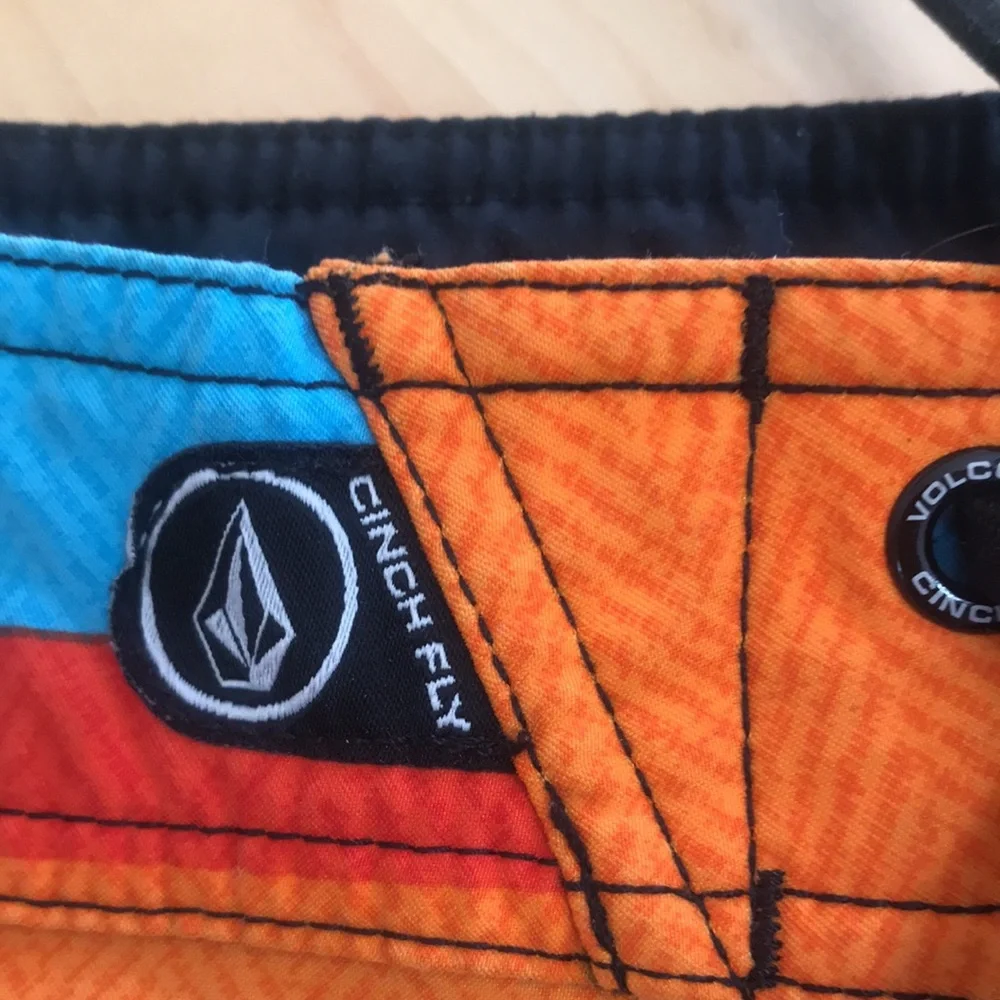 Volcom swim trunks size 33‎ orange and turquoise great condition